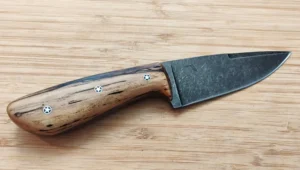 Right side view of Spalted Pecan Goldilocks #329 with stonewashed 1095 high carbon steel blade and Mosaic pins by Grebec Knives.