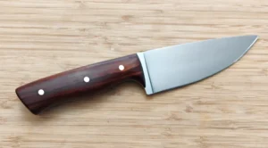 Custom camp knife, 9 1/2" Cocobolo Drop Point with brushed blade, Cocobolo handle, brass pins, and leather retention strap sh