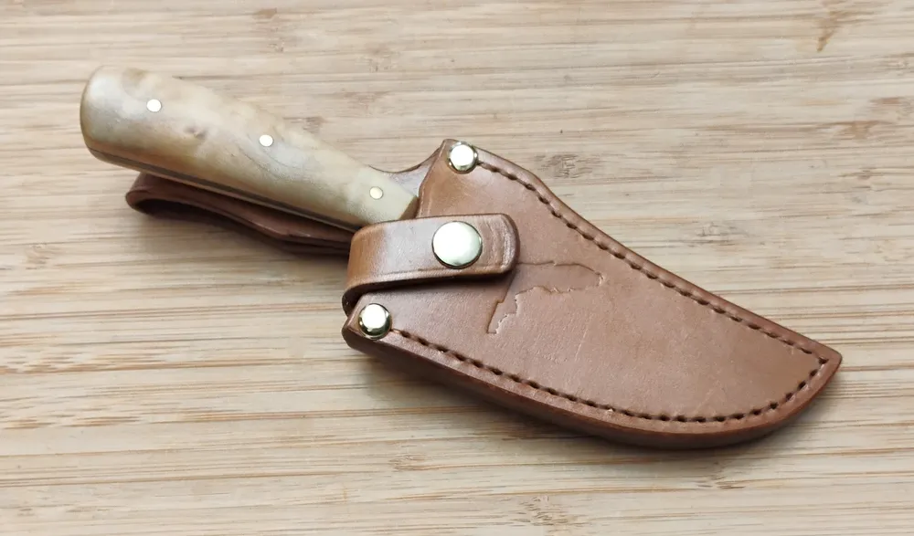 GreBec 7.5-Inch FL Magnolia Upswept Clip Point Knife in Custom Sheath with Florida stamp on face of sheath.