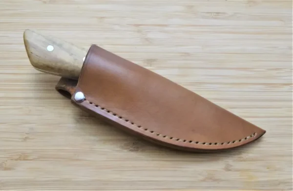 Custom 3 Finger Skinner knife with Florida Pignut Hickory, secured in hand-crafted leather pouch sheath.