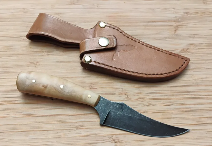 GreBec 7.5-Inch FL Magnolia Upswept Clip Point EDC Knife Next to Custom Sheath with Florida stamp