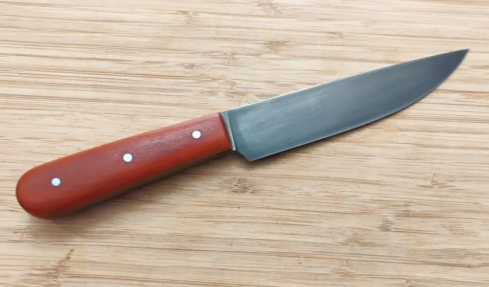 Full right view of Pernambuco Scalper Trade Knife #349 with antiqued 5 1/2" blade and Pernambuco handle.