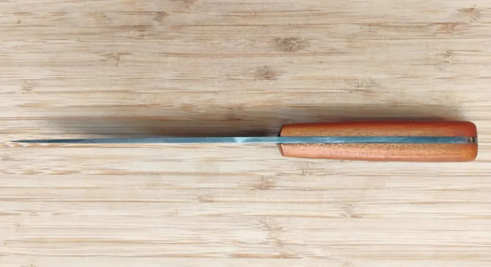 Spine view of Pernambuco Scalper Trade Knife #349 with 1095 high carbon steel with distal taper and wood handle.