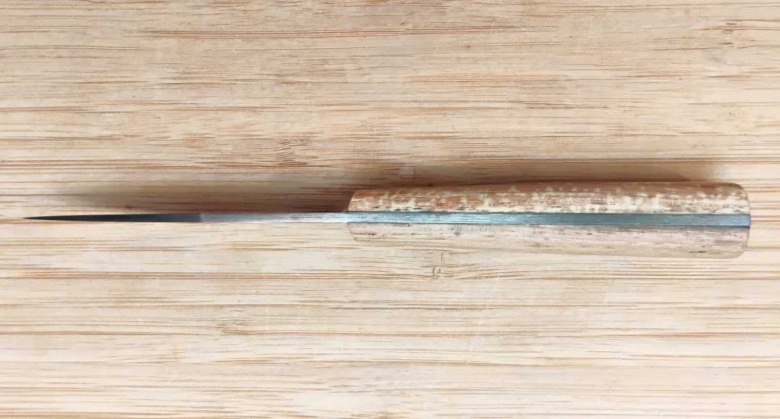 Pecan Tiny Trade Knife #366 spine view, highlighting the full-tang construction, designed for strength in kitchen and camp use.