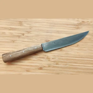 Bur Oak English Trade Knife #381 right side view on bamboo surface, showing antiqued 1095 high carbon steel blade with Florida logo.