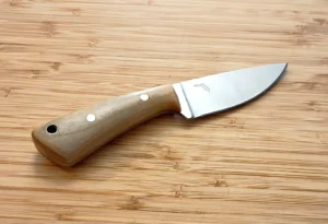 GreBec Knives Crepe Myrtle Caping Knife #393 – right view showing brushed 1095 steel drop-point blade with etched Florida state outline and stabilized Crepe Myrtle handle with brass pins