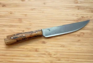Handcrafted English trade knife with antiqued 1095 steel blade and stabilized Florida spalted pecan handle by GreBec Knives