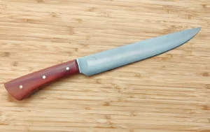 Right view of the Plateau carving knife displaying a brushed blade and stabilized Red Cedar handle.