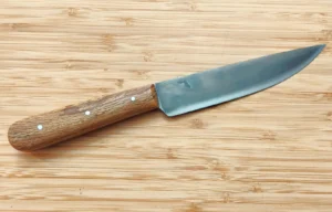 Custom historic trade knife with stabilized Florida Bur Oak wood handle and Florida logo on the antiqued high carbon steel blade.