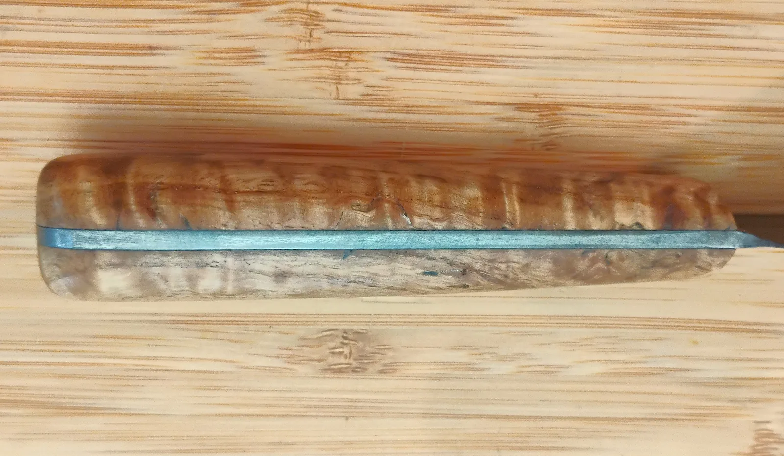 Top view of a Dunstan Chestnut custom handle on a steel French trade knife from GreBec Knives.