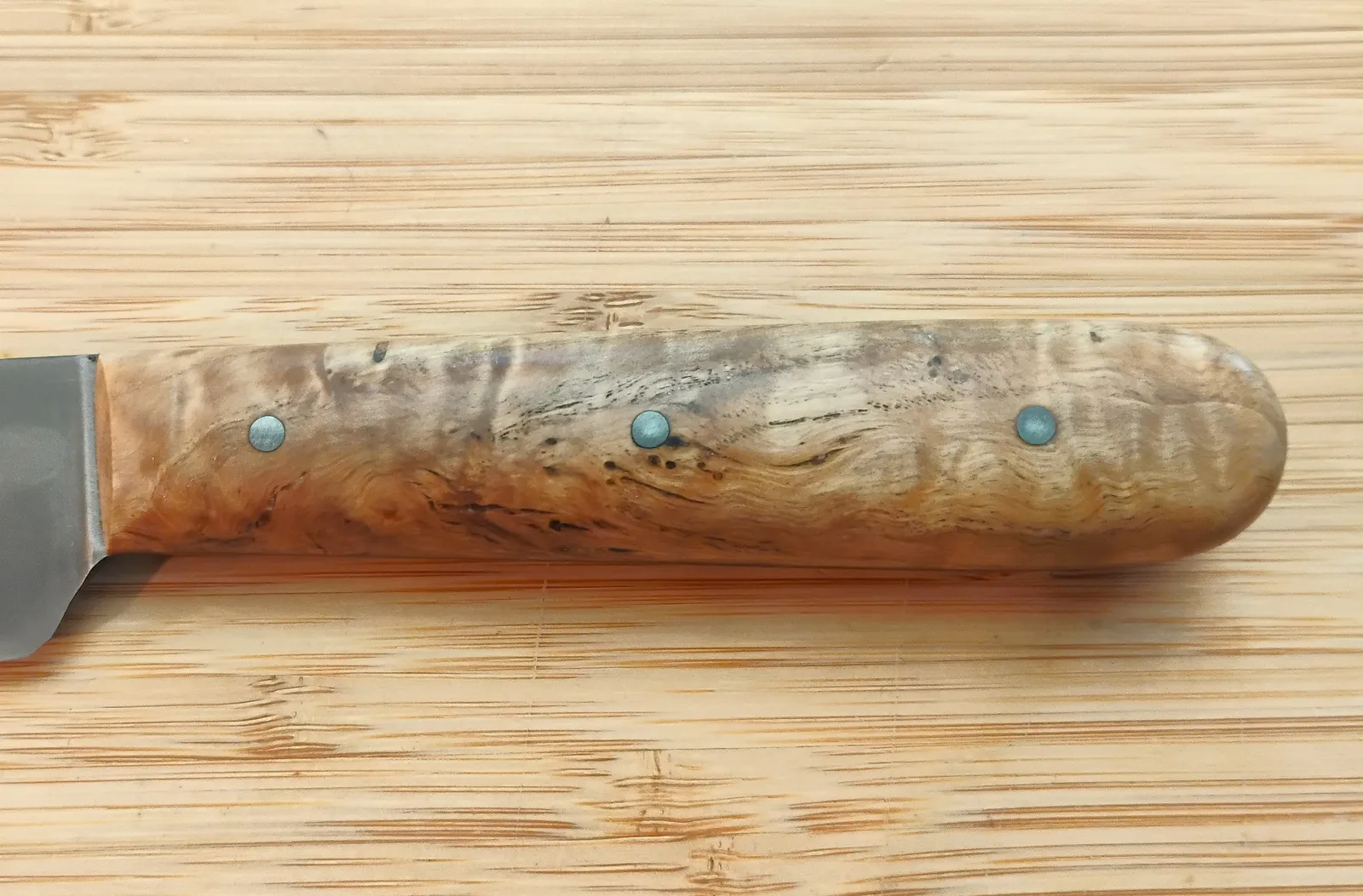 Dunstan Chestnut custom knife handle showing heavy figuring and peened D10 Bright finishing nails