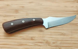 Right view of the Live Oak Trail Skinner #461, displaying the full profile of a trailing point blade with the Florida logo and dark Live Oak handle with mosaic pins.