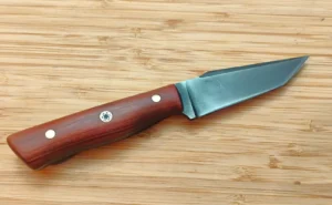 Right side view of the Red Cedar American Tanto #469 the State of Florida etched onto the dark, acidized blade.